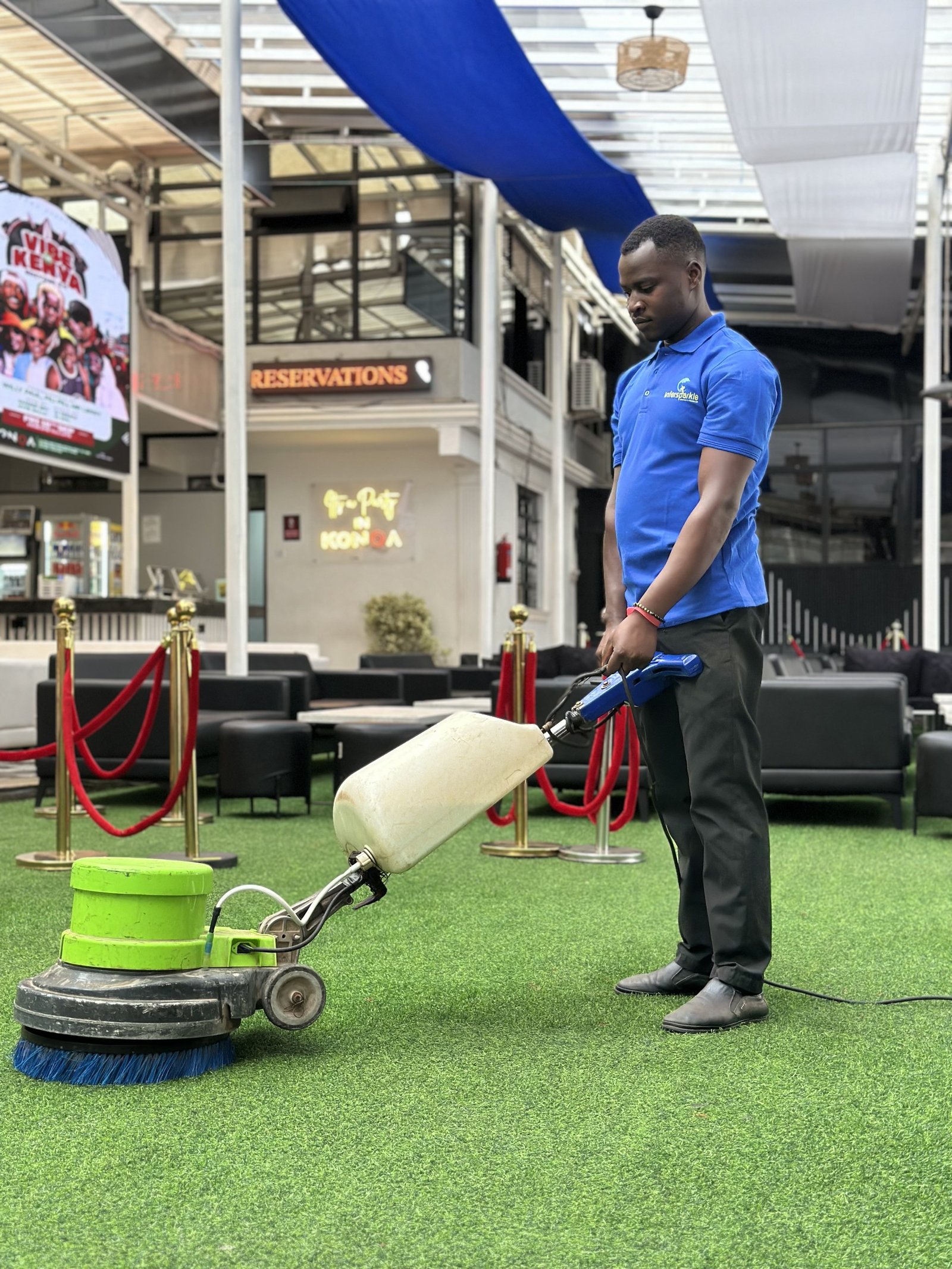 Machine-scrubbing the floor of a venue